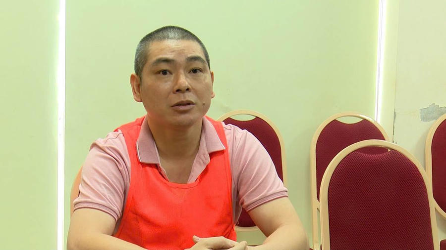 Đối tượng Lương Song Hào tại cơ quan Công an. (Ảnh: Công an TP Hà Nội)