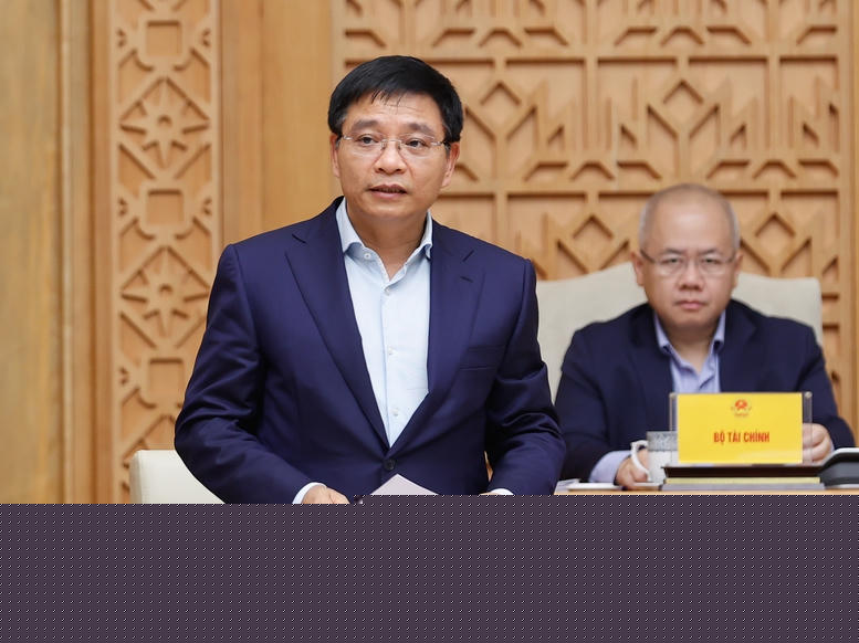 Bộ trưởng Bộ Tài chính Nguyễn Văn Thắng báo cáo tại phiên họp - Ảnh: VGP/Nhật Bắc