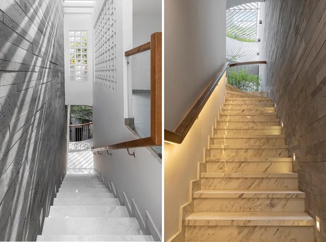 Mặc d&ugrave; l&agrave; một dự &aacute;n đa mục đ&iacute;ch, kh&aacute;ch h&agrave;ng mong muốn c&oacute; sự ph&acirc;n định rạch r&ograve;i giữa kh&ocirc;ng gian ở v&agrave; kh&ocirc;ng gian l&agrave;m việc. V&igrave; vậy, cầu thang được bố tr&iacute; ngay cạnh cửa ngăn c&aacute;ch lối đi lại của c&aacute;c th&agrave;nh vi&ecirc;n trong gia đ&igrave;nh v&agrave; nh&acirc;n vi&ecirc;n c&ocirc;ng ty. L&ocirc; gia được trang tr&iacute; bằng &ldquo;tấm r&egrave;m tự nhi&ecirc;n&rdquo; được tạo th&agrave;nh bởi những d&acirc;y leo xanh mướt nhằm ngăn những tia nắng chiếu qu&aacute; s&acirc;u v&agrave;o ph&ograve;ng ngủ. Phong c&aacute;ch tối giản được kh&aacute;ch h&agrave;ng y&ecirc;u cầu trong thiết kế nội thất ph&ograve;ng ngủ.