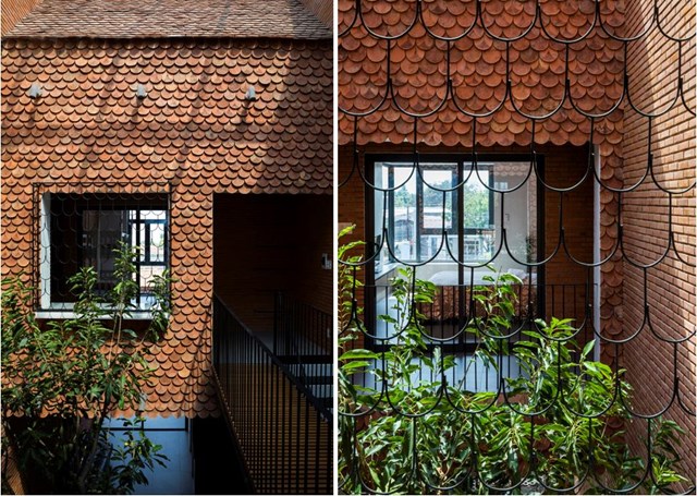 Hệ thống ng&oacute;i vảy c&aacute; bao bọc bốn m&aacute;i hi&ecirc;n trong v&agrave; ngo&agrave;i nh&agrave; tạo n&ecirc;n h&igrave;nh khối h&agrave;i h&ograve;a với c&ocirc;ng năng sử dụng. Tất cả đem lại một chốn b&igrave;nh y&ecirc;n lưu giữ mọi kỷ niệm của gia đ&igrave;nh.