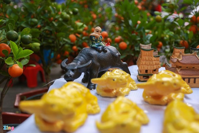 Tiểu cảnh thiết kế linh vật của năm mới T&acirc;n Sửu, trang tr&iacute; cho chậu c&acirc;y th&ecirc;m sinh động.