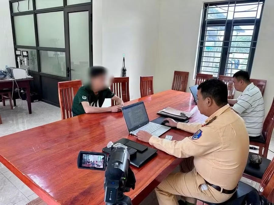 Lê Quang Kh. Làm việc với cơ quan công an..