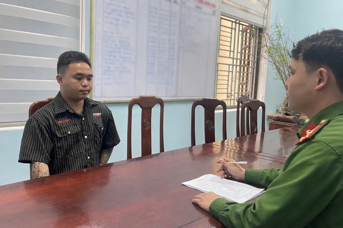 Cơ quan Công an làm việc với đối tượng Nguyễn Văn Nghĩa. Ảnh: CACC